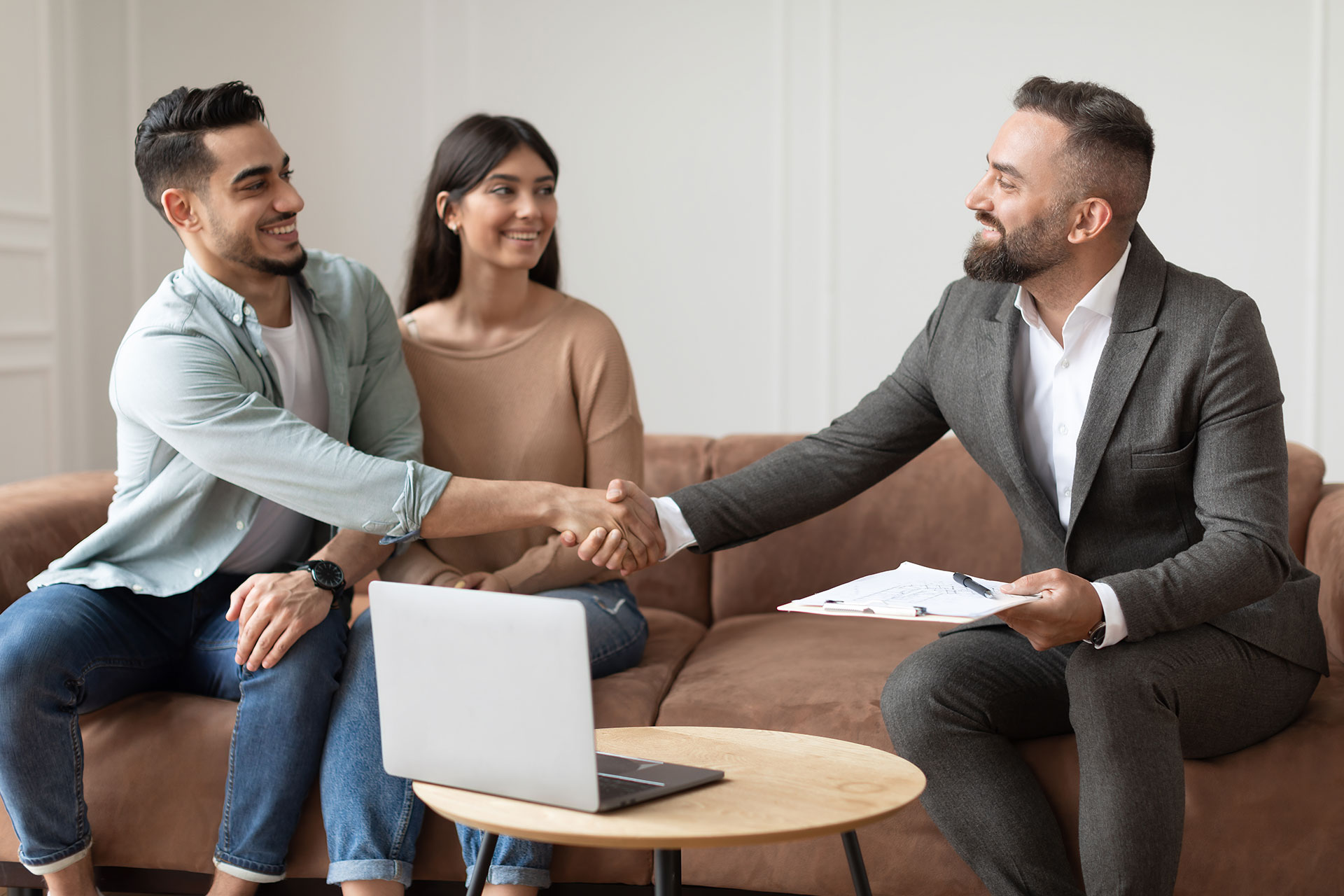 Couple Buying New Apartment Shaking Hands With Re 2022 12 16 06 40 45 Utc